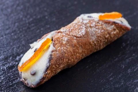 Single sweet cannolo from sicily Stock Photos