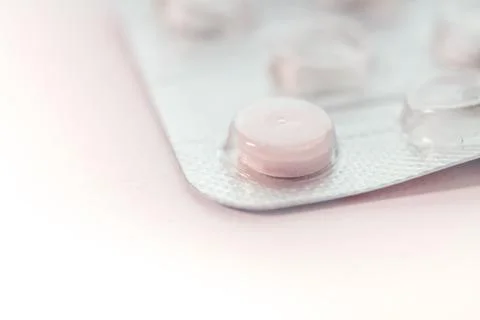Single tablet in blister Stock Photos