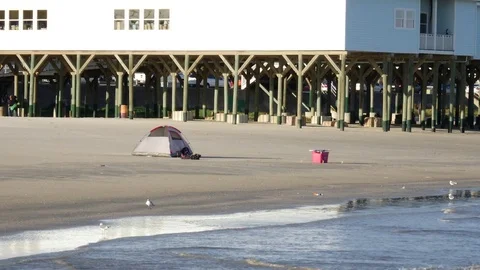 Single Tent Camping on the Beach with Ocean Waves Red Ice Cooler Stock Footage 84005590