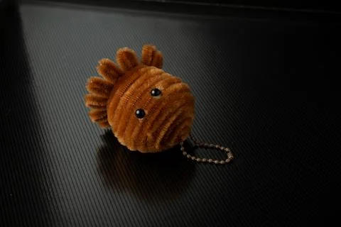 Single toy in the form of a brown octopus ornament Stock Photos