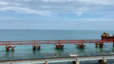 A single track Railway Bridge over the sea next to Pamban Bridge Stock Footage 164875188