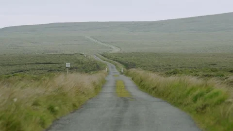 A single-track road with a passing place Stock Footage 332135613