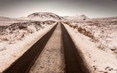Single track through the snow Stock Photos