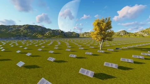 Single Tree And Solar Pannels Sorrounded By Mountains Stock Footage 72642082