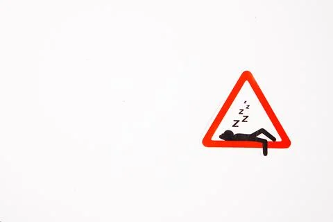 A single triangular novelty sign sticker depicting a Lazy Zone or Sleeping .. Stock Photos