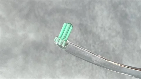 Single tuft brush close up on a gray background Stock Footage 313356183