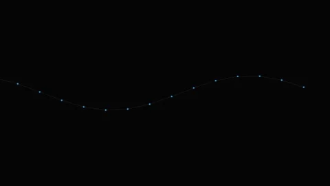A single undulating line of small glowing lights set against a dark backgroun Stock Footage 339615636