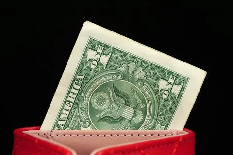 Single USD in red wallet concept of money saving and budget control Stock Photos
