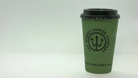 Single use coffee cup pull focus Stock Footage 85850997