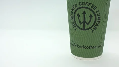 Single use coffee cup tilt shot Stock Footage 85850383