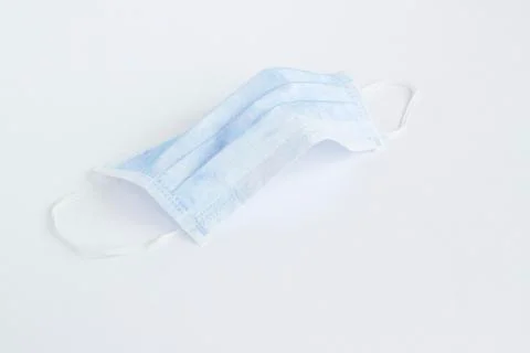 Single use hygenic face mask on white background Stock Photos