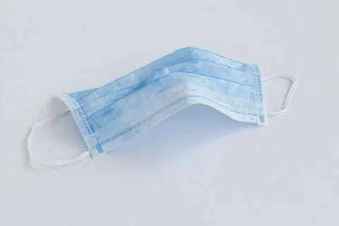Single use hygenic face mask on white background Stock Photos