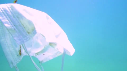 Single-Use Mask Underwater Stock Footage 144811163