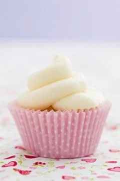 Single vanilla cupcake Stock Photos