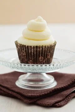 Single vanilla cupcake Foto stock