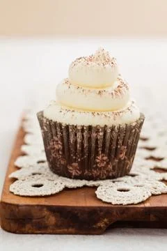 Single vanilla cupcake Foto stock