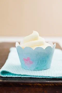 Single vanilla cupcake Stock Photos