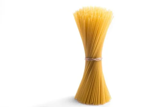 Single Vertical Bundle of Raw Spaghetti Pasta on White Background Foto stock