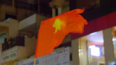 Single Vietnamese flag celebrates over U23 male football team silver medal Stock Footage