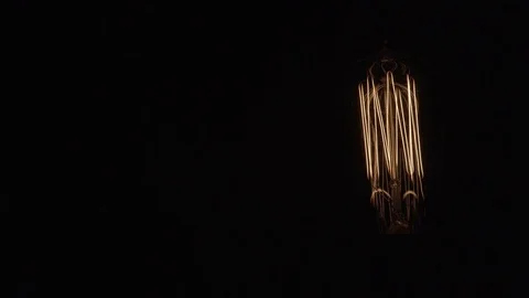 Single Vintage Edison Light Bulb On Black Element Right 動画素材 71331472