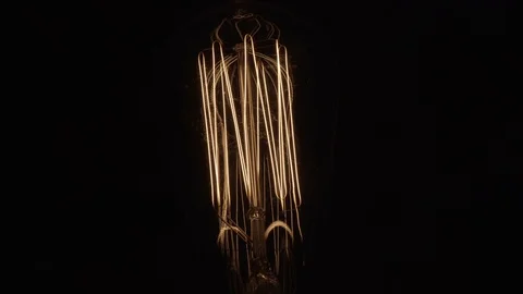 Single Vintage Edison Light Bulb On Black Element Close Up Middle 動画素材 71331478