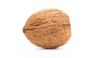 Single walnut isolated rotating on white background Stock-Footage 85929650