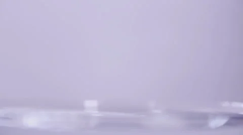 Single water drop slow motion side view Stock Footage 58761360