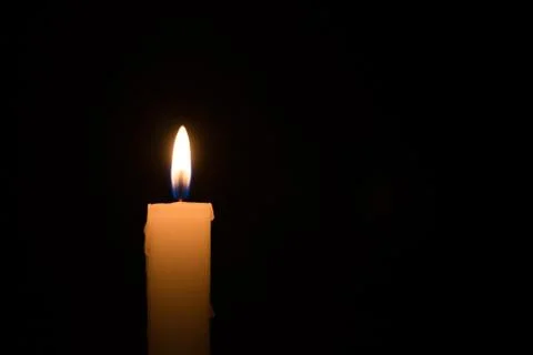 Single White Candle at Night Stock Photos