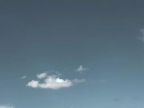 Single white cloud in blue sky 写真素材