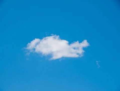 Single White Cloud in Blue Sky 写真素材
