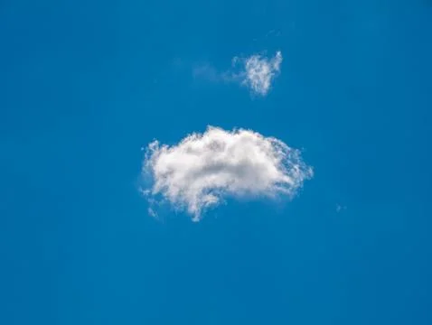 Single White Cloud in Clear Blue Sky 写真素材