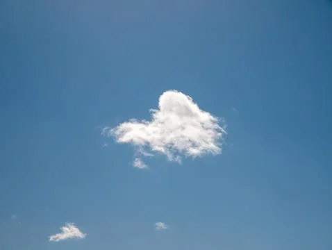 Single White Cloud in Clear Blue Sky 写真素材