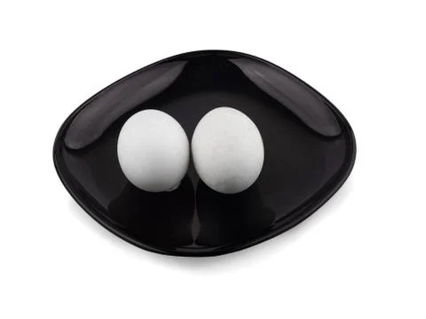 Single white egg isolated on white background Stock Photos