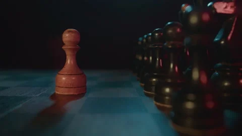 Single White Pawn Against An Army Of Black Chess Stock Footage 155276799
