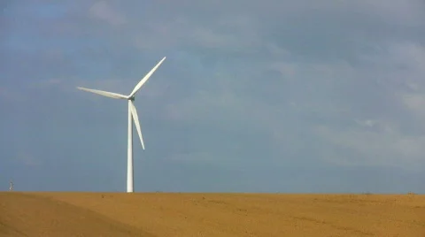 Single wind turbine with field Stock Footage 843098