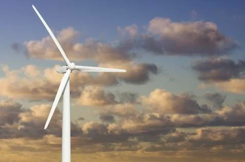Single Wind Turbine Over Dramatic Blue Sky and Clouds. Stock Photos