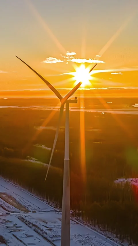 Single Wind Turbine Spinning Close Up Against Bright Sun Star Sunset Timelapse Stock Footage 342470121