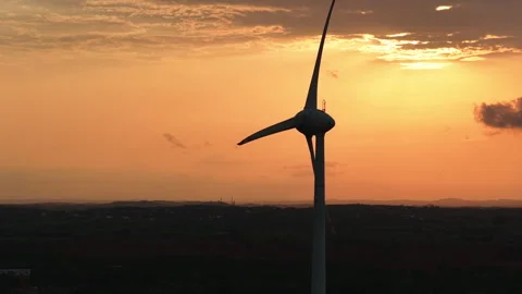 Single Wind Turbine at Sunset with Cloud Formation Stock Footage 335804660