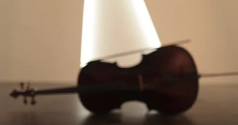 Single woman playing the cello, close-up and medium Stock Footage 240125863