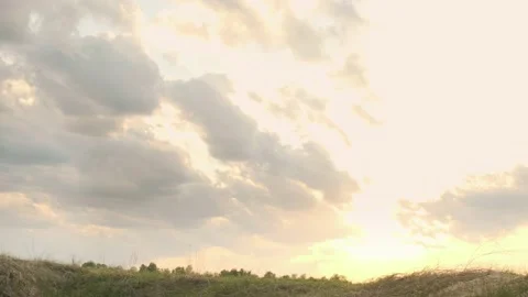 A single wooden cross against a dramatic sky background. Christian cross on the Stock Footage 199265837