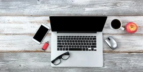 Single work station technology on white desktop for business or education use Stock Photos