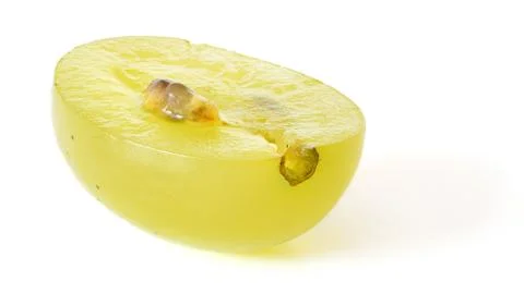 Single yellow grape fruit cut in half isolated on white background Stock Photos