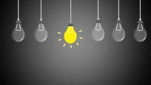 A single yellow light bulb glows brightlyamong  a row Video stock 334660602