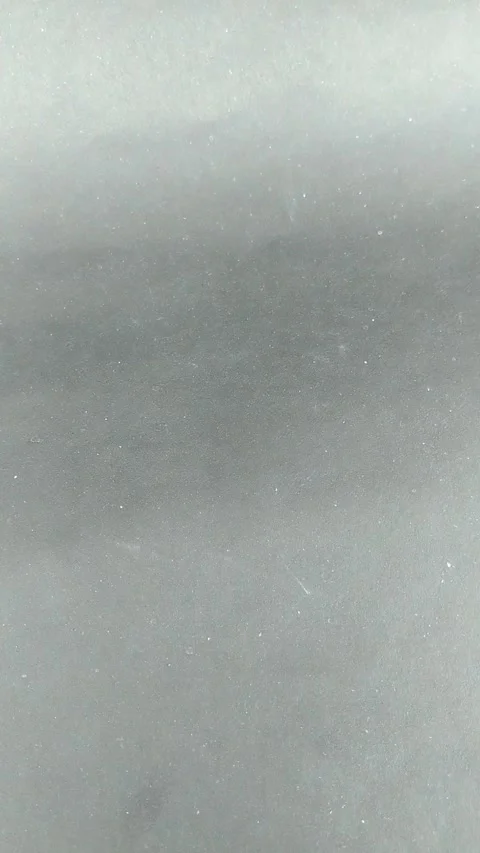 A single yellow pill on a dark surface. Vidéo 335464770