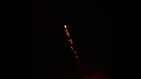 Singular defocused firework with focus pull Video stock 235227447