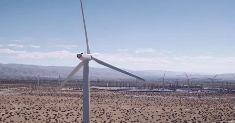 Singular Windmill Spinning In The California Desert Stock Footage 79127048