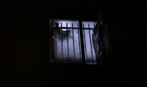 Sinister broken window Stock Photos