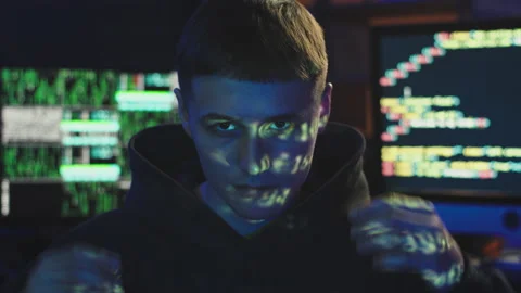 A sinister hacker puts on a hood Video stock 178869559