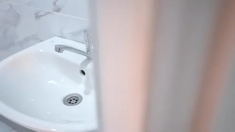 Sink in the bathroom Stock Footage 254006653