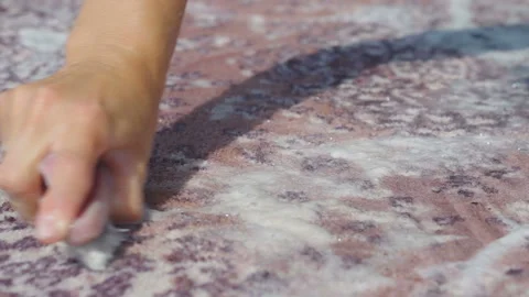 Sink of a carpet hands Stock Footage 91125923